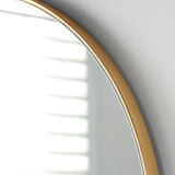 Gold oval mirror