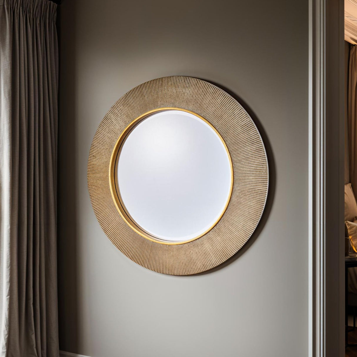 Large round gold mirror