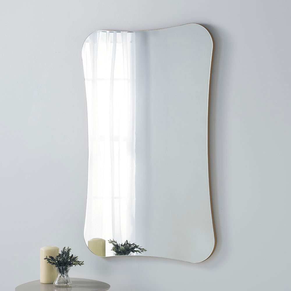 Curved frameless mirror