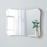 Curved frameless mirror