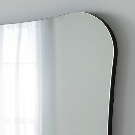 Curved frameless mirror