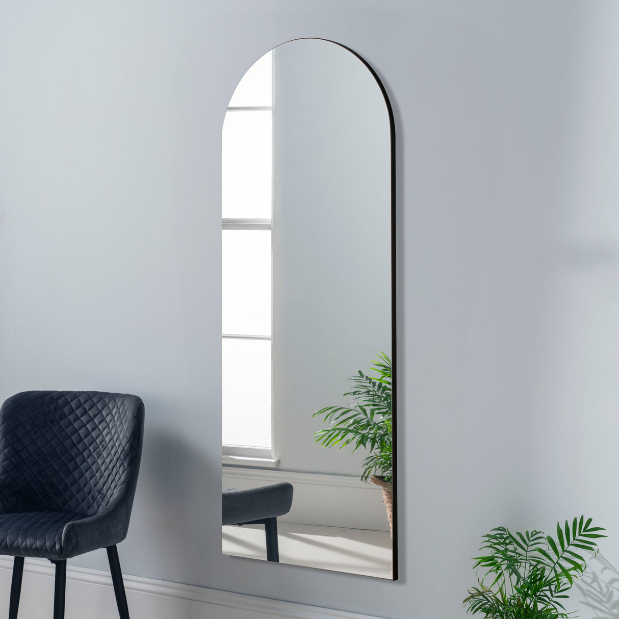 Frameless arched full length mirror