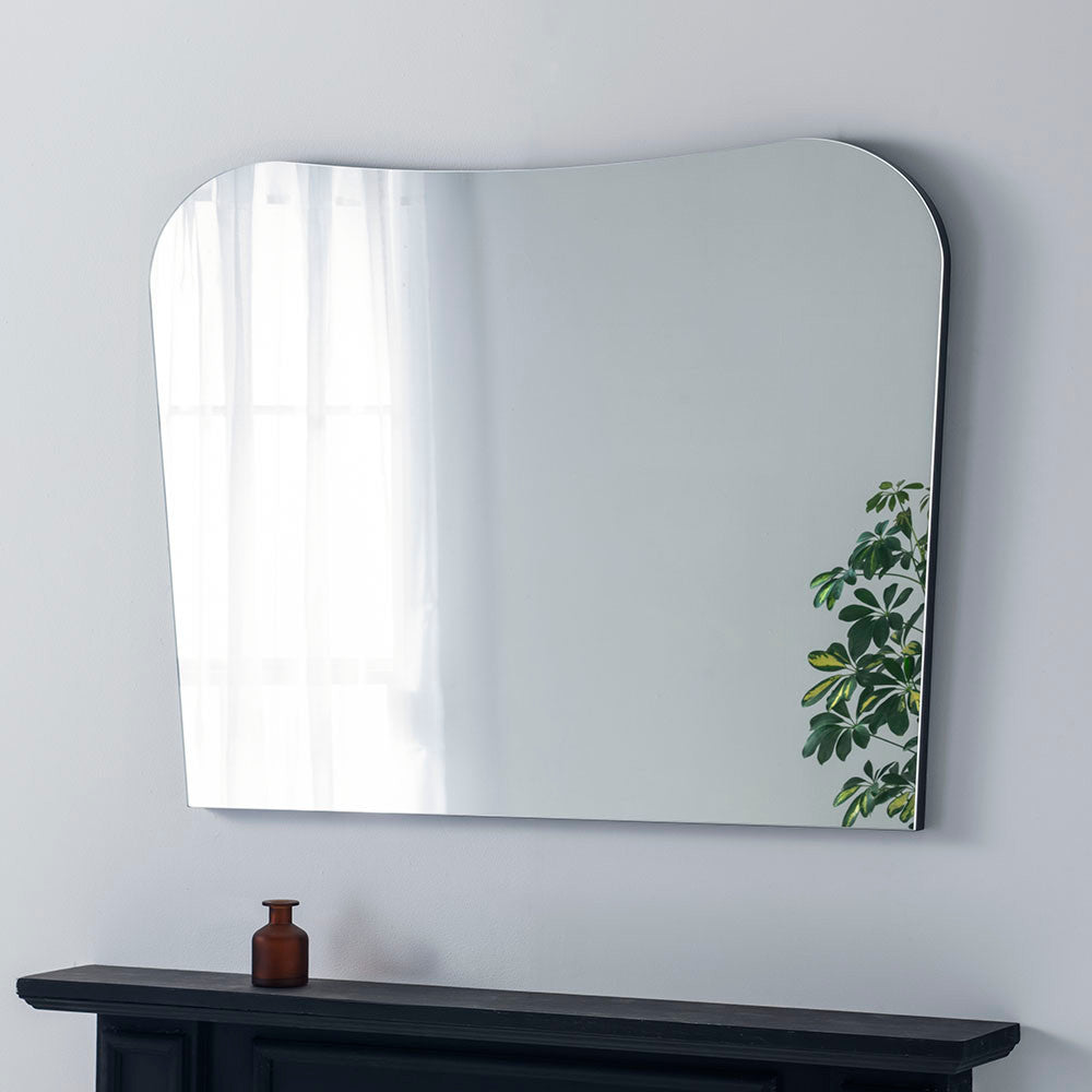 Curved mantle mirror