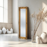 Tall carved french style mirror in gold