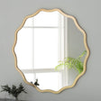 Scalloped round mirror in gold