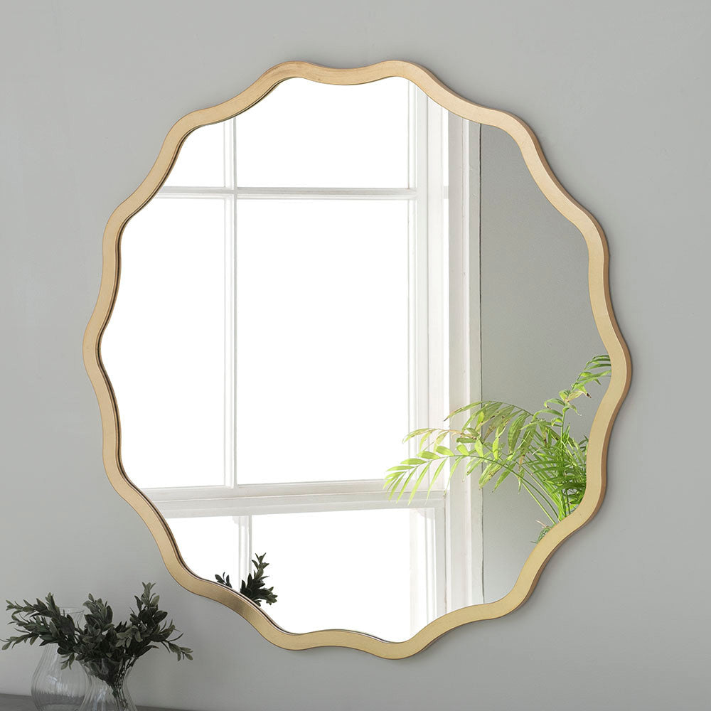 Scalloped round mirror in gold